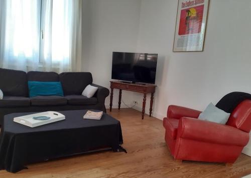 Μια τηλεόραση ή/και κέντρο ψυχαγωγίας στο Mimizan Plage Grande maison bord de mer