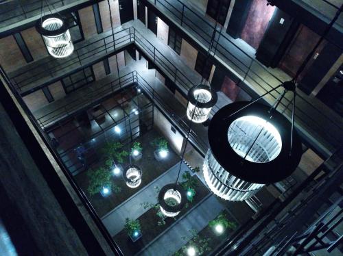 an overhead view of a building with lights at The Art Hotel Medellin in Medellín