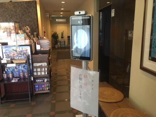 a cell phone on a display in a store at Nagasaki Orion Hotel in Nagasaki