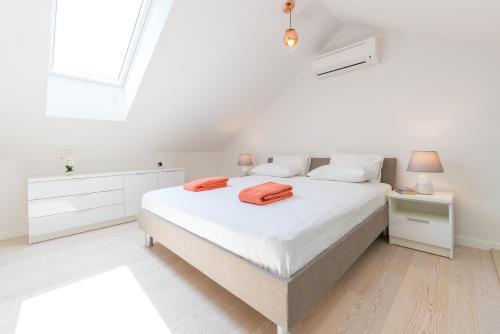 Postel nebo postele na pokoji v ubytování TopDeck Exclusive Apartment
