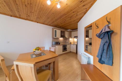 
A kitchen or kitchenette at Pearl Spa Apartments Pamporovo
