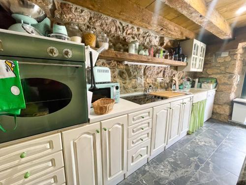 Η κουζίνα ή μικρή κουζίνα στο Kuća za odmor Paun