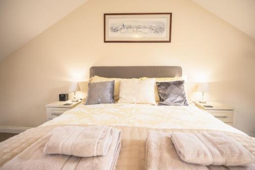 Postel nebo postele na pokoji v ubytování Middle Row Cottage