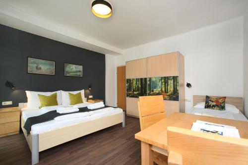 Postel nebo postele na pokoji v ubytování Seehotel Sissi