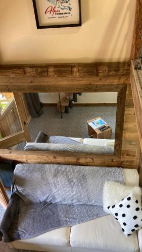 a room with three beds sitting on the floor at Studio Mezzanine Megeve centre in Megève