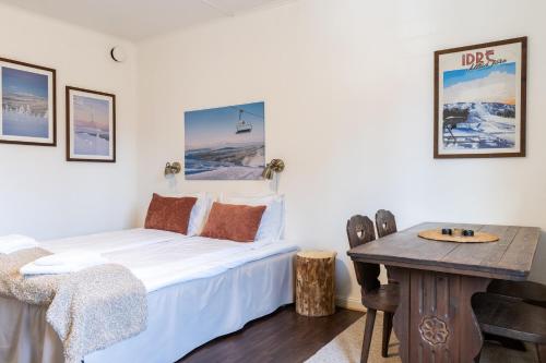 Кровать или кровати в номере Sporthotellet Idre