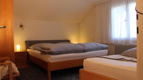 Voodi või voodid majutusasutuse Appartement Maria toas