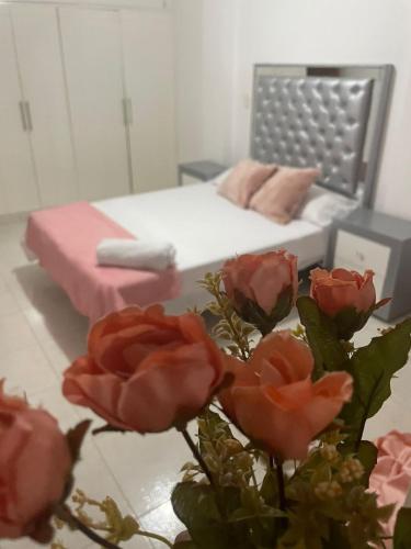 Ένα ή περισσότερα κρεβάτια σε δωμάτιο στο Apartamento en Buga a 7min de la Básilica