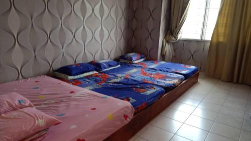 Postel nebo postele na pokoji v ubytování Sekinchan No 4 Landed House 15pax