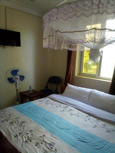 Ein Bett oder Betten in einem Zimmer der Unterkunft Dich Comfort Hotel University Branch