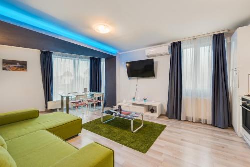 TV a/nebo společenská místnost v ubytování Royal Accommodation