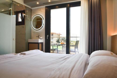 Katil atau katil-katil dalam bilik di Artline Luxury Suites