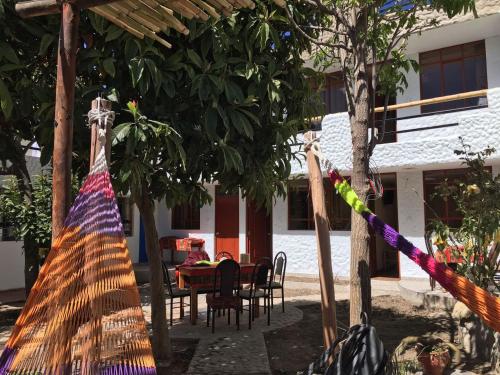 Un balcón o terraza en Las Palmeras Eco Hostel