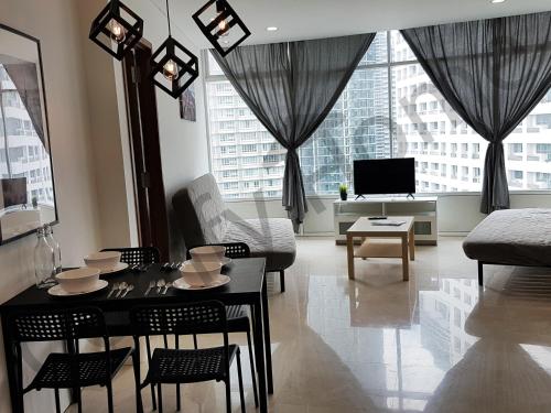 Area tempat duduk di KLCC Service suites by Home Sweet Home