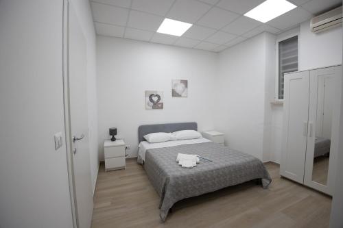 Postel nebo postele na pokoji v ubytování Giusvinci