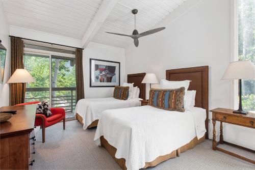 a hotel room with two beds and a desk at Standard 3 Bedroom - Aspen Alps #803 in Aspen