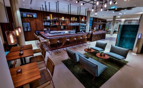 an overhead view of a bar in a restaurant at Hotel Das Zeit in Lenzing