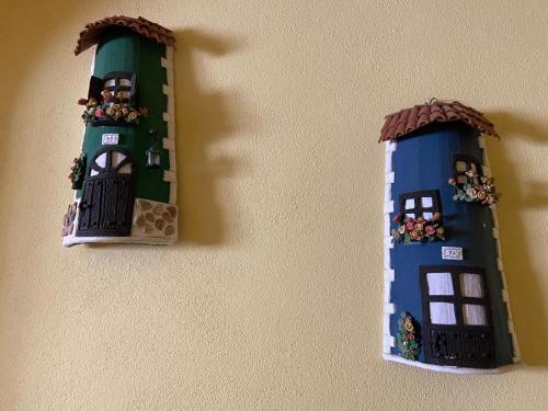 a lego house and a mirror on a wall at El Abigero in La Fregeneda