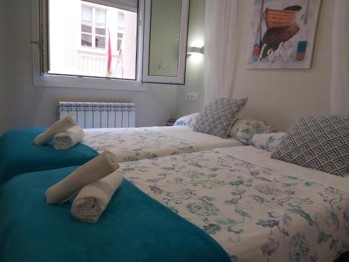 Ένα ή περισσότερα κρεβάτια σε δωμάτιο στο EL RINCON DE LA MERCED. Centro, Aire acondicionado , wifi. Junto a Laurel