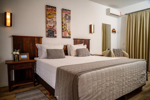 Кровать или кровати в номере Pousada Ondas da Brava