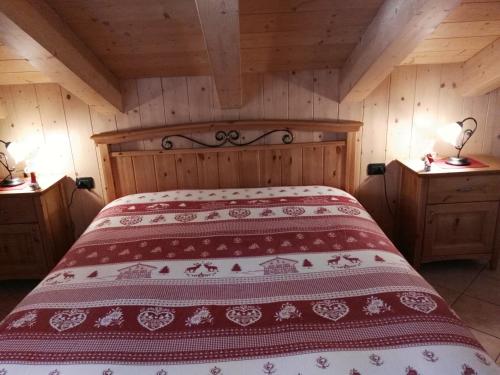 Posteľ alebo postele v izbe v ubytovaní Chalet Alberti