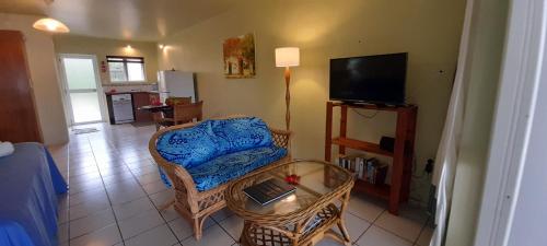 Televisyen dan/atau pusat hiburan di Avana Waterfront Apartments