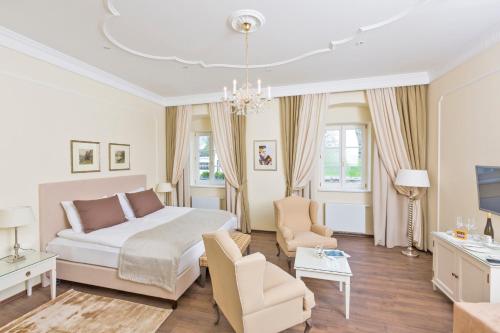 En eller flere senge i et værelse på Barock-Landhof Burkhardt