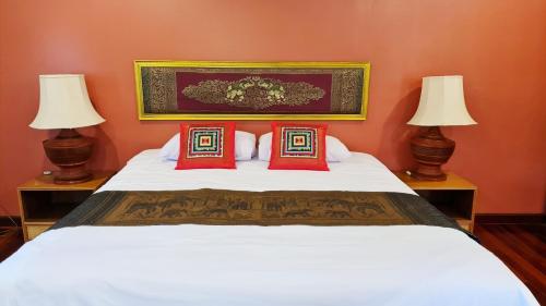 Ένα ή περισσότερα κρεβάτια σε δωμάτιο στο Hotel Siblanburi Resort