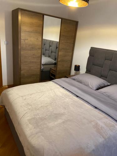 Ένα ή περισσότερα κρεβάτια σε δωμάτιο στο Apartman Martes