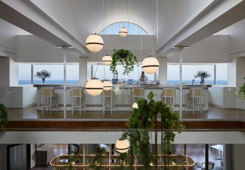 Ein Restaurant oder anderes Speiselokal in der Unterkunft Amus Hotel & Spa 