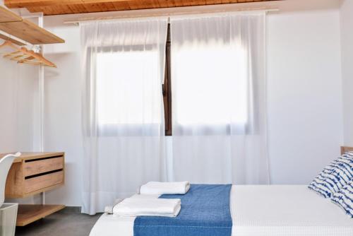 Katil atau katil-katil dalam bilik di Casa Rural Cal Saboner