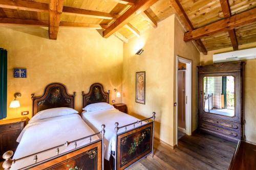 A bed or beds in a room at Cantina Anzivino - Affittacamere