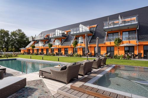Πισίνα στο ή κοντά στο Luxus Resort Rügen Residenz Kubitzer Bodden