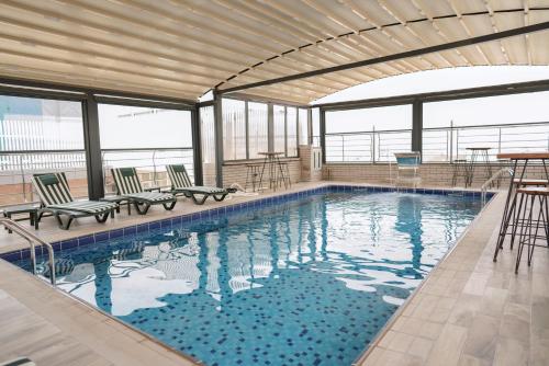 Бассейн в Noor Land Hotel или поблизости