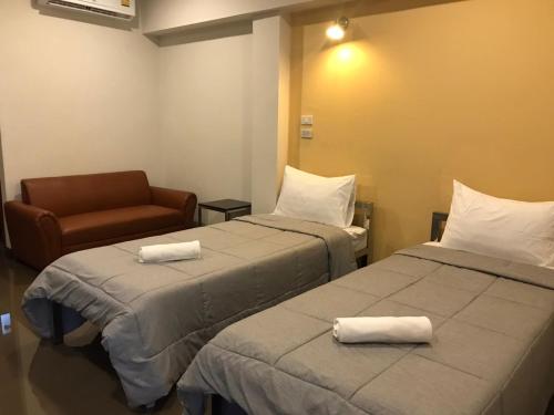 Un pat sau paturi într-o cameră la DD Residence Sai5 Salaya ห้องพัก ดีดี สาย5 ศาลายา