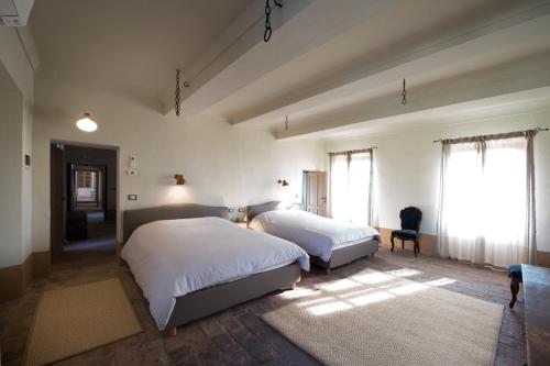 Ένα ή περισσότερα κρεβάτια σε δωμάτιο στο Tenuta Favorita Country House B&B