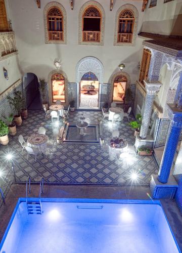 an aerial view of a house with a swimming pool at Riad Sayeda Al Hora in Fès