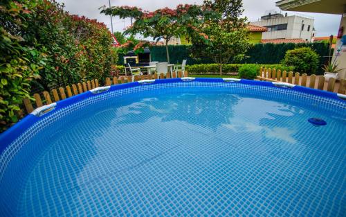 Kolam renang di atau dekat dengan Green Suites Miengo - Apto Completo