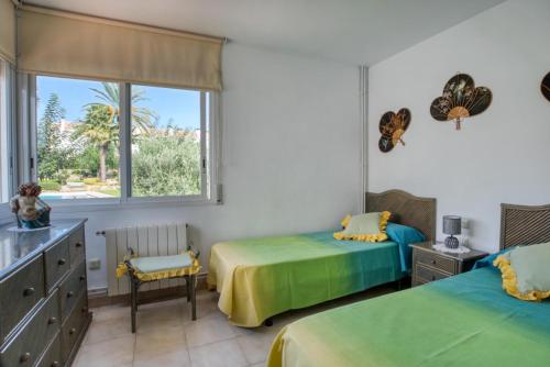 Llit o llits en una habitació de Big Villa Sagaró