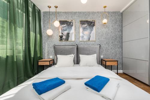 Posteľ alebo postele v izbe v ubytovaní Apartament Moniuszki by Your Freedom