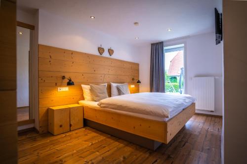 Ein Bett oder Betten in einem Zimmer der Unterkunft Kaltenbach's Appartements am Badeparadies
