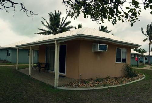 a small house with a porch at Sea View Villa. 2 bedroom. Sleeps 4. Free WIFI in Victoria Park