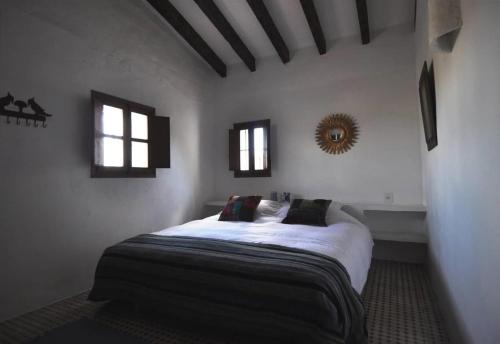 Postel nebo postele na pokoji v ubytování Finca Los Monteros