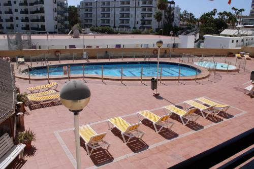 Utsikt över poolen vid Tropical Canary Home - Playa Del Ingels eller i närheten