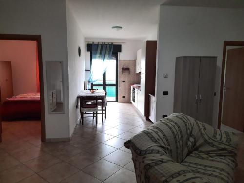 Posteľ alebo postele v izbe v ubytovaní La Rosa dei Venti Apartments Two
