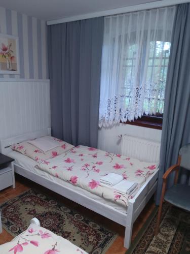 Posteľ alebo postele v izbe v ubytovaní Pokoje gościnne Sobieszow