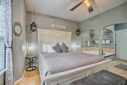 a bedroom with a bed and a bath tub at Branson Resort-Style Retreat 4 Mi to Strip in Branson