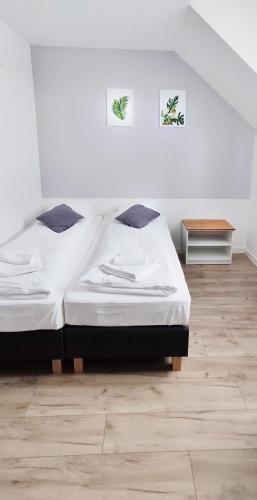 Postel nebo postele na pokoji v ubytování SOKÓŁ
