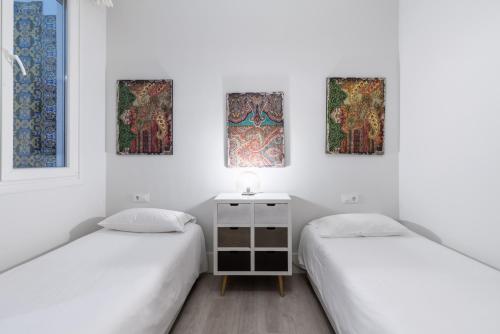 Posteľ alebo postele v izbe v ubytovaní AoA Green Gardens Suites