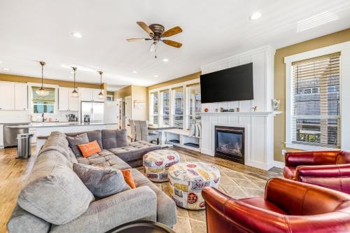 a living room with a couch and a fireplace at Driftwood Star in Lincoln City